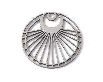 May include: A silver metal pendant with a circular design featuring a sunburst pattern and a crescent moon shape.