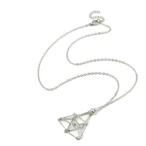 May include: A silver-toned necklace featuring a delicate chain and a geometric pendant shaped like a stylized fox head. The pendant is constructed from thin, textured metal lines that form an open, angular structure with a small ring at the top.