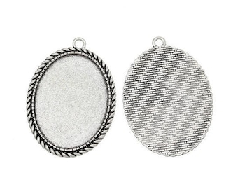 10 pieces pendants, settings, cabochon, 30 x 40 mm, silver
