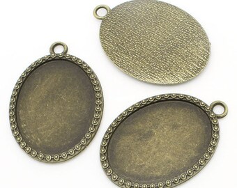 10 pendants with setting, e.g. for cabochons, 51 x 36 mm, bronze