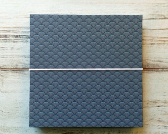 Scrapbooking album for photos and scraps, 24 or 36 pages 13 x 13 cm, white or black cardboard, hand-bound, blue fan pattern