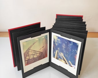 Polaroid handmade accordion album, 12 or 24 pages of black cardboard, with slots for Polaroid or Instax Wide, measures 10 x 14 cm, various colors