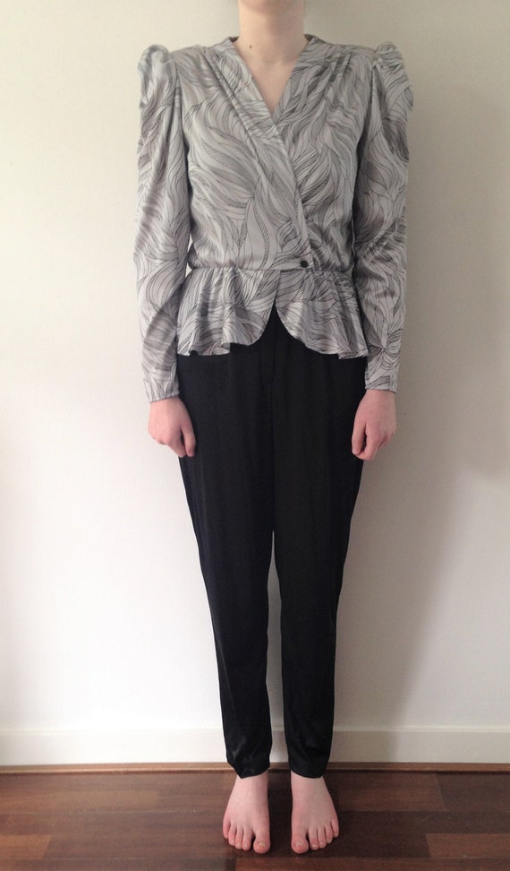 Lovely 80s jumpsuit with puffy sleeves and shoulde