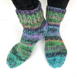 Wool slipper socks made with green, blue, purple, grey and orange yarn, size 5 UK