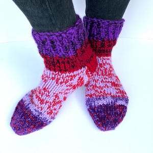 Chunky knitted slipper socks in purple, red, lilac and black colours, wool free yarn size 4 UK