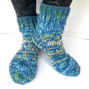 Chunky knitted slipper socks in blue, green and yellow wool free yarn, size 5 UK