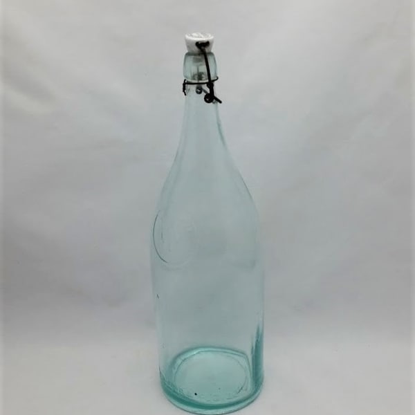 Antique 1880s Wagner's Quality Waters Cincinnati Ohio 64 Ounce Soda Water Bottle Blue Glass  With Karl Hutter Porcelain Lightning Stopper