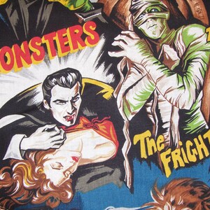 May include: A vintage-style illustration of a monster movie poster featuring a vampire, a mummy, and a creature from the black lagoon. The poster is titled "Monsters" and "The Fright".