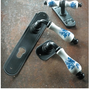 Athen - Wrought iron and porcelain door handle collection