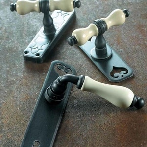Kopenhagen collection - wrought iron door handles with Bavarian Porcelain