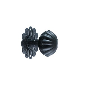 May include: Black metal curtain rod finial with a fluted ball design and a decorative flower-shaped base.