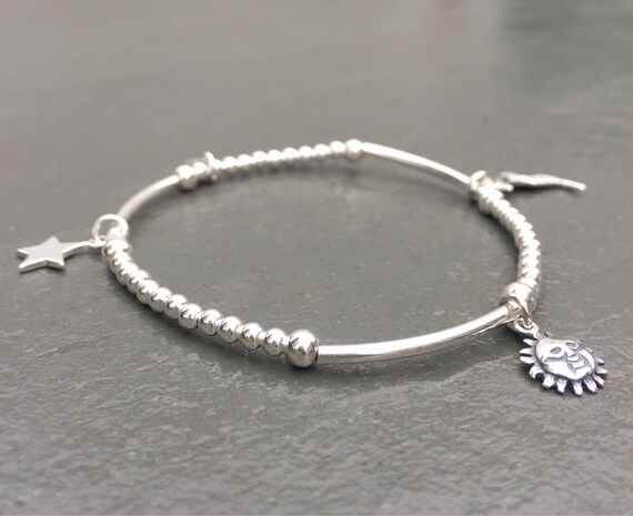 stacking charm bracelets