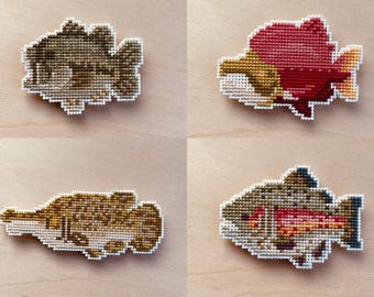 Kruissteekpatroon zoetwatervis: regenboogforel, bigmouth-baars, sockeyezalm, alligatorgaren
