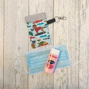 Blaue Surfhunde Handyklammer auf Beutel für Hund Walking oder Hand Sanitiser