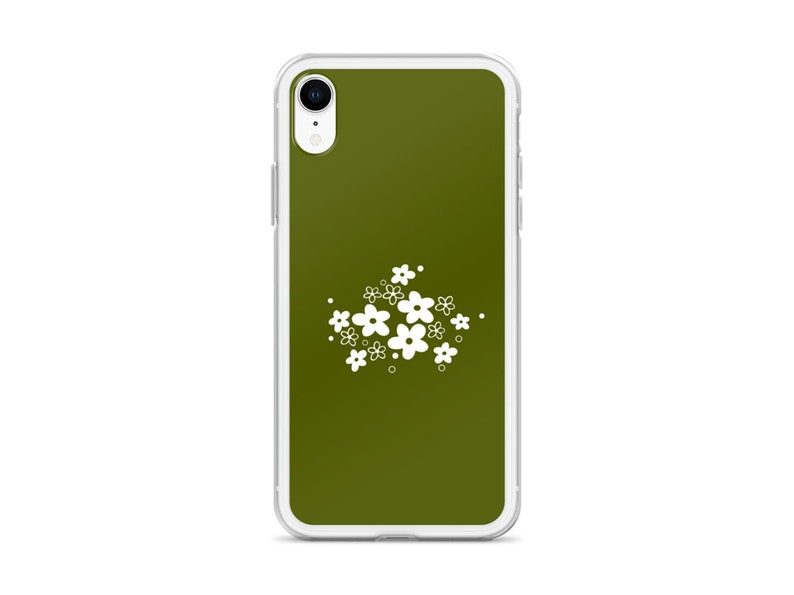 Pu&ograve; includere: Una custodia per telefono trasparente con sfondo verde e un design floreale bianco.