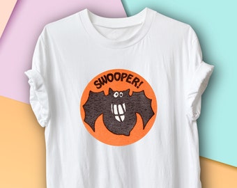 Vintage Halloween Scratch and Sniff Sticker Graphic T-Shirt, Swooper Bat design, Nostalgia 1980s