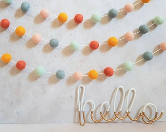 Muted rainbow pom pom garland, boho nursery decor, felt ball garland, unisex nursery, playroom decor, baby shower bunting, orange bunting