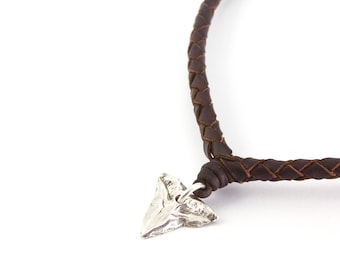 Original shark teeth fused in silver.