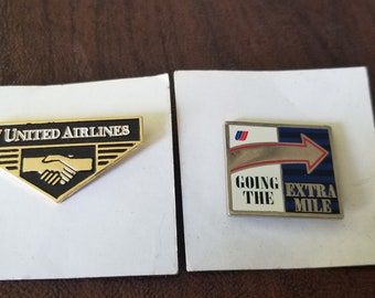 Vintage Pair of United Airlines Lapel Pins, 1 Gold-toned Pin with Clasped Hands & 1 Silver-toned Pin with Enameling-"Going the Extra Mile,"