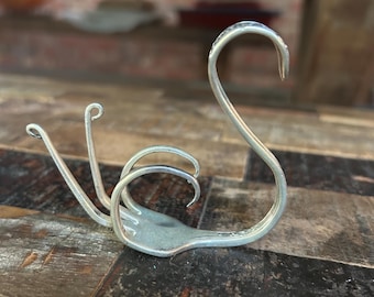Vintage Tudor Plate Oneida fork swan sculpture, symbol of wisdom and grace