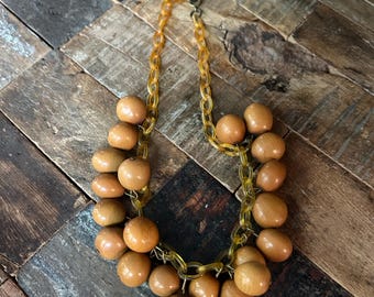 Vintage 16 inch golden brown lucite/celluloid chain choker with multiple brown beads dangling