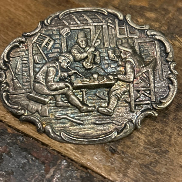 Vintage silver tone repousse  tavern/saloon/barroom scene brooch, stamped metal pin