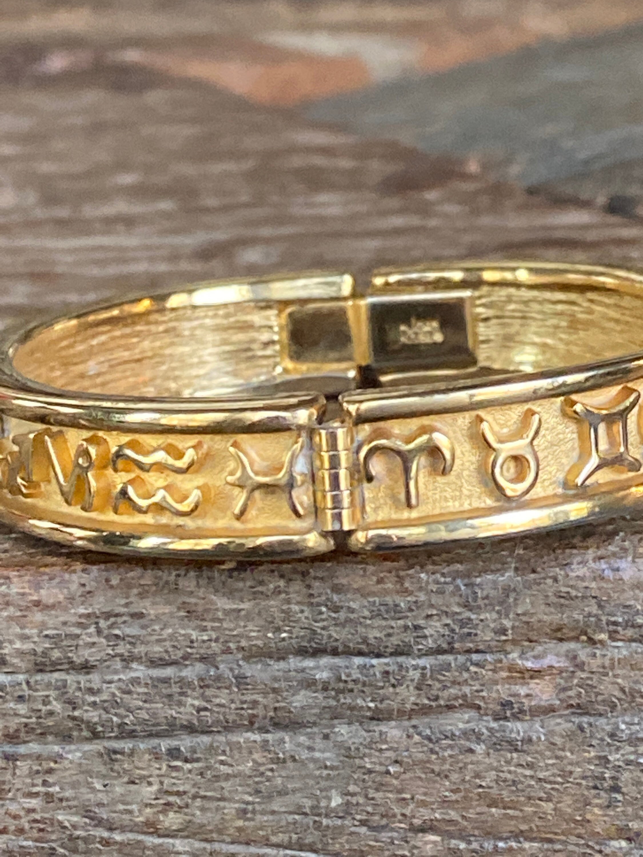 Vintage gold tone Joan Rivers zodiac sign hinged bangle Etsy