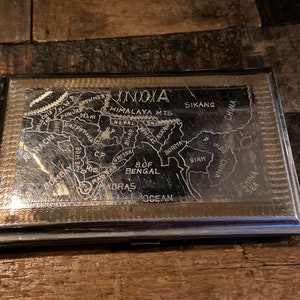 vintage cigarette case india Vintage Silver Tone and Gold Tone Cigarette Case Etched With a Map of India  on One Side and an Image of the Taj Mahal on the Other