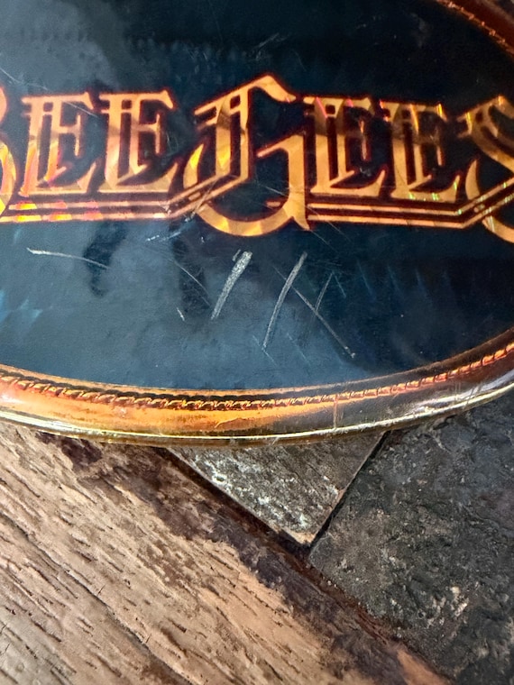 Bee Gees 1978 Pacifica Mfg vintage oval shaped holographic belt buckle, pop music memorabilia View 4