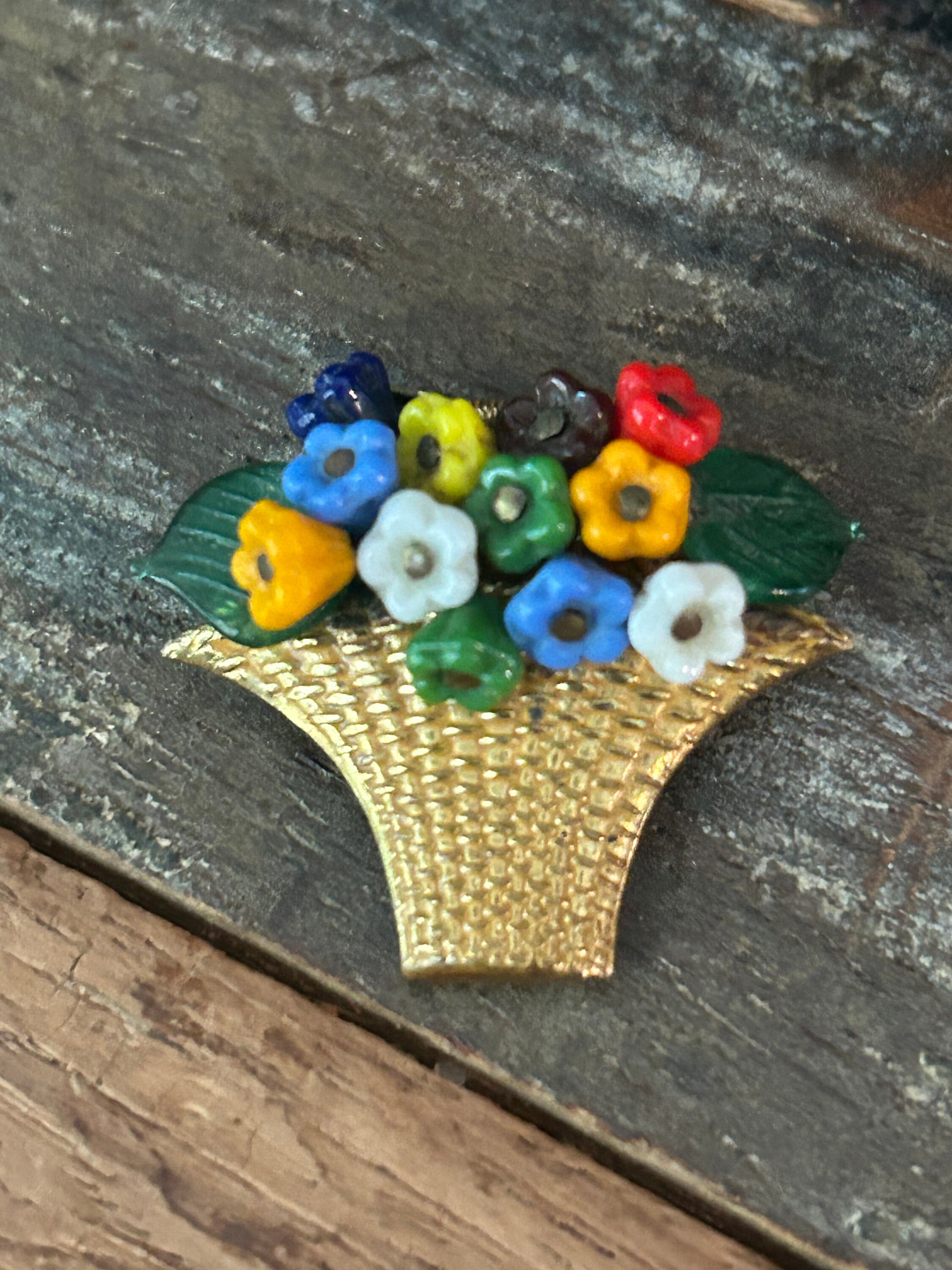 Small vintage antique gold tone and beaded floral basket dress clip, could be Miriam Haskell
