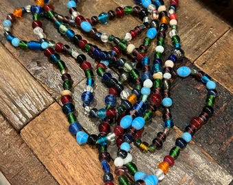 Multicolored 88 inch strand of glass beads, opaque and transparent, different sizes and shapes