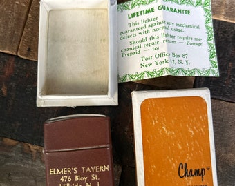 Vintage faux leather Champ cigarette lighter advertising Elmer's Tavern in original box