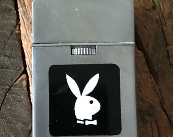 Vintage Japanese cigarette lighter with the iconic Playboy Bunny image