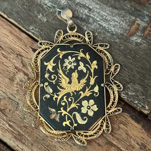 Vintage Damascene and filigree 8 sided bird and flower pendant