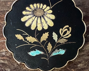 Vintage scalloped pin/pendant with damascene and enamel floral design