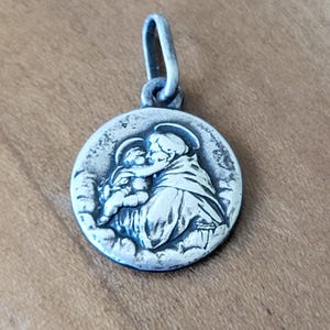 Vintage 800 Silver St. Anthony Religious Medal with &quot;Touched to the Tongue&quot; Canvas Relic, Tiny Third Class Relic Medal, Patron of Lost Items