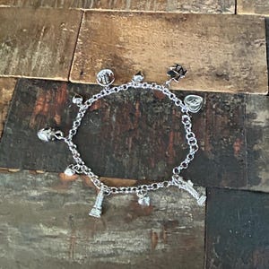 925 sterling silver New York City 8 inch charm bracelet with 10 little themed charms, Big Apple, Statue of Liberty, Empire State Building