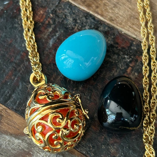 Joan Rivers Classic Collection gold tone interchangeable colored egg pendant on 30 inch chain, 3 eggs, orange black turquoise