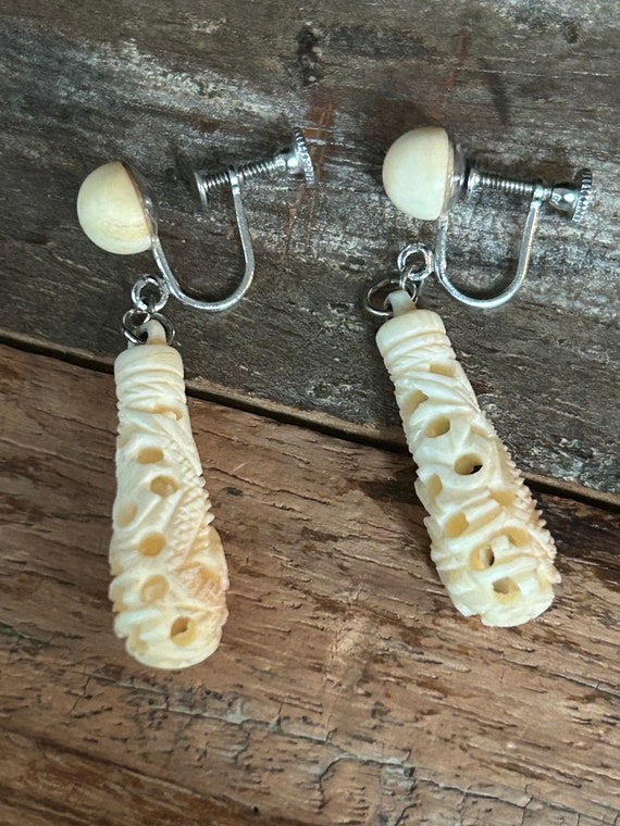 Carved bone? Asian themed dragon drop dangle sterl
