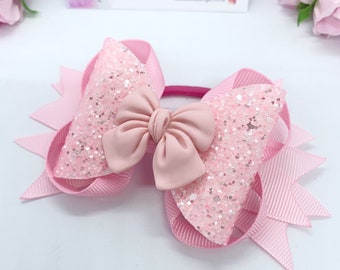 Lazo apilable con purpurina rosa: accesorio para el cabello para niña