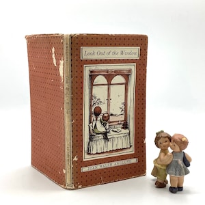 First U.K Edition (1962) of “LOOK OUT of the WINDOW” by Joan Walsh Anglund in Non-Price Clipped (7 Shillings & Sixpence) Dust Jacket