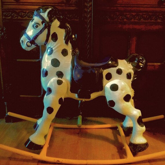 old metal rocking horse
