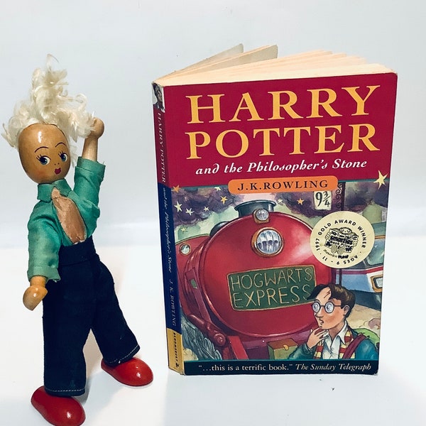 First Edition 1997 Issue Harry Potter and the Philosopher’s Stone 22nd Printing with the Joanne Rowling name (not JK Rowling) & Young Wizard