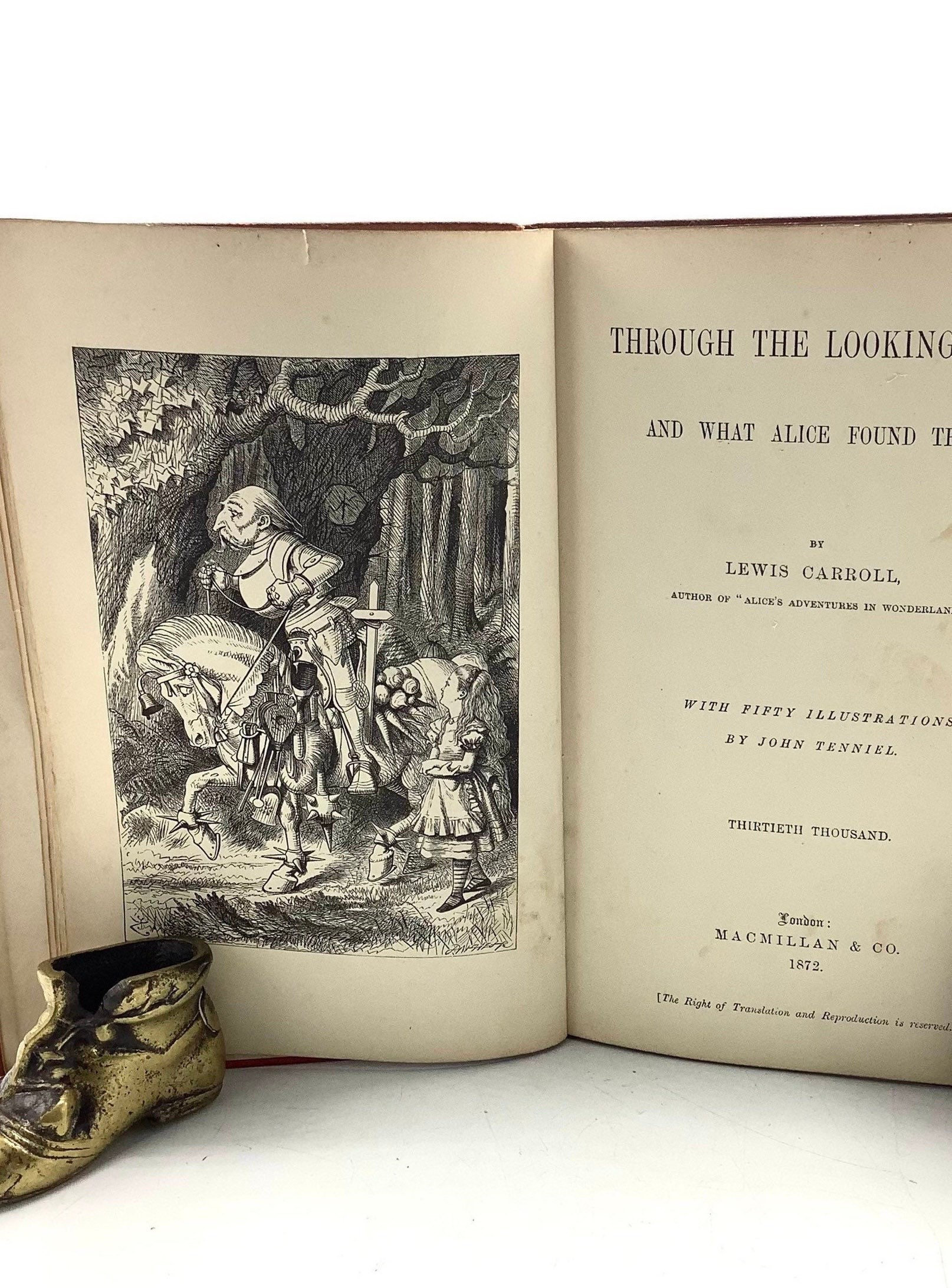 First Edition 1872 “THROUGH The LOOKING GLASS” by Lewis Carroll, Illustrated by Sir John Tenniel, Published in London
