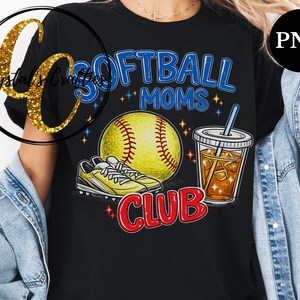 May include: Black t-shirt with a softball graphic. The design includes a yellow softball, yellow cleats, a drink with ice, and the words "Softball Moms Club" in blue and red.