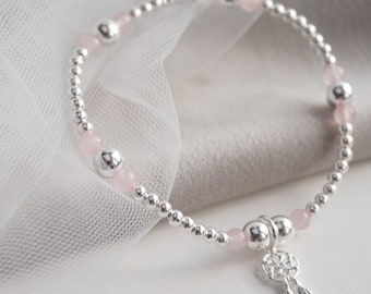 Sterling Silver and Rose Quartz bead stretch bracelet with Dreamcatcher charm