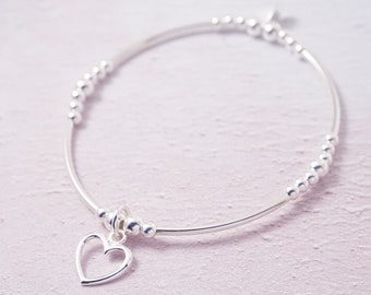 Sterling Silver noodle stretch bracelet with Open Heart charm