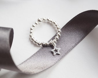 Sterling Silver stretch ring with Star charm