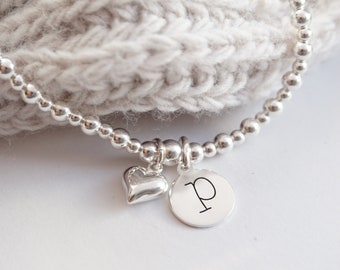 Sterling Silver stretch bracelet with 1 Lowercase Initial charm and Heart charm