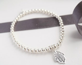 Sterling Silver stretch bracelet with Hamsa Hand charm